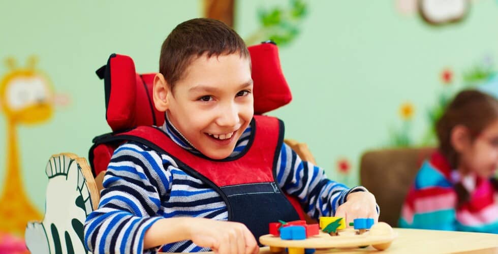 Brinquedos adaptados para paralisia cerebral|