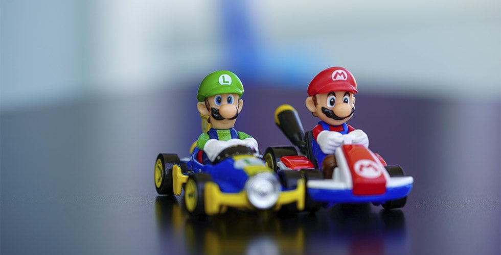 Imagem de bonecos do Mario e do Luigi